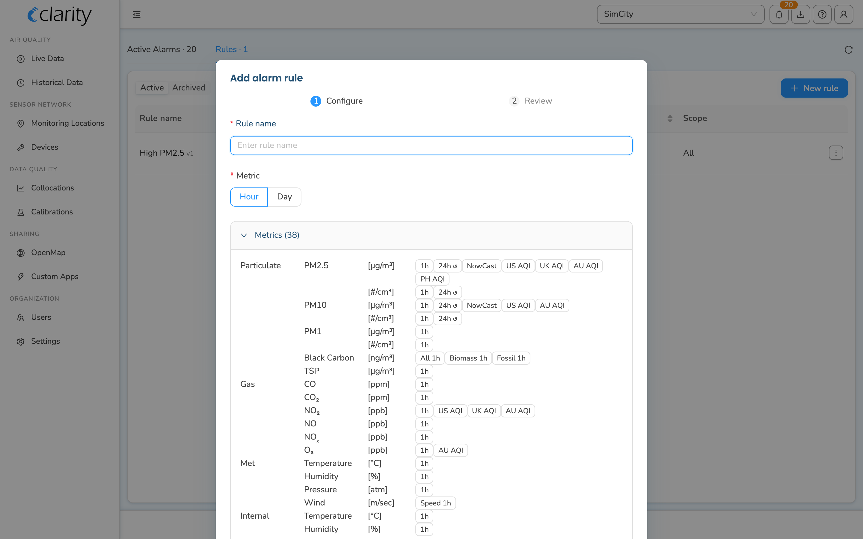 Add alarm rule dialog on the Configure step showing the rule name, Hour/Day frequency, and the metrics grid