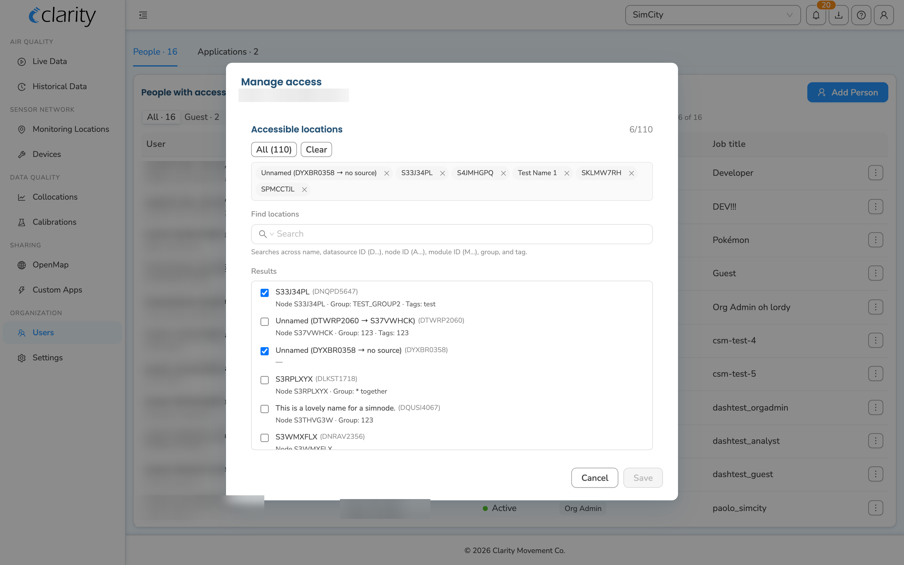 The Manage access dialog for a guest, with the guest's email as the subtitle and the searchable location multi-picker showing selected and available locations