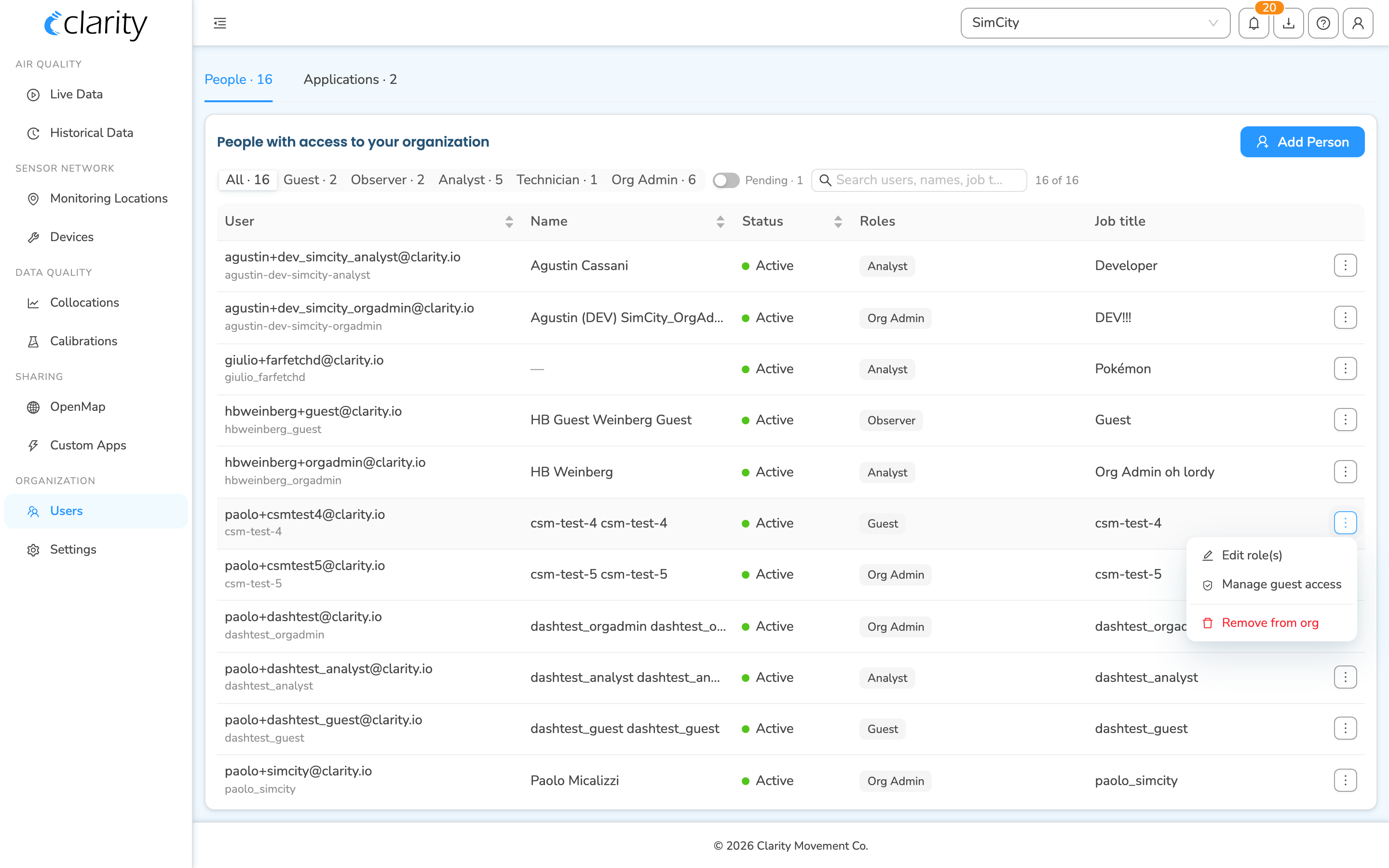 A row's ⋮ Row actions menu open, showing Edit role(s), Manage guest access, and Remove from org