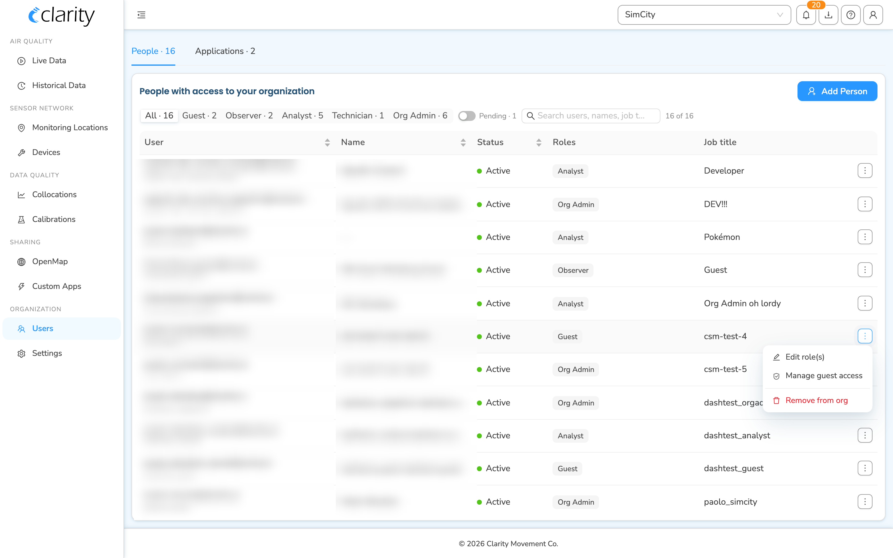A row's ⋮ Row actions menu open, showing Edit role(s), Manage guest access, and Remove from org